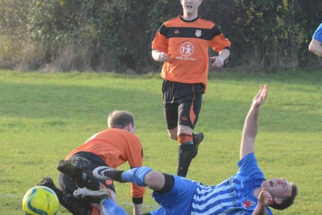 Action from Thorney (orange) 1, Pinchbeck 5 in the Peterborough Premier Division. Photo: David Lowndes.