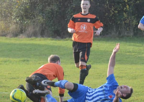Action from Thorney (orange) 1, Pinchbeck 5 in the Peterborough Premier Division. Photo: David Lowndes.