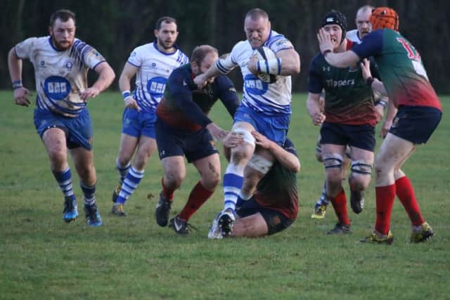 Darren Fox charges forward for the Lions in their pre-Christmas win over Lichfield. Picture: Mick Sutterby