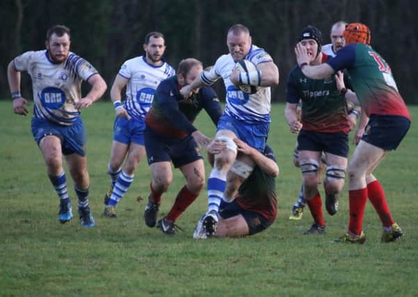 Darren Fox charges forward for the Lions in their pre-Christmas win over Lichfield. Picture: Mick Sutterby