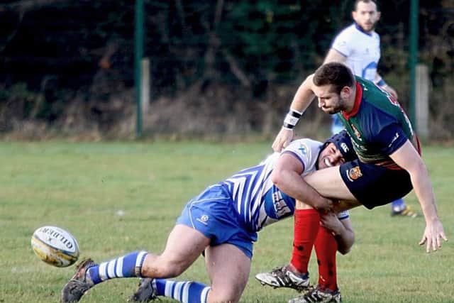 Nico Defeo makes a great tackle for the Lions against Lichfield. Picture: Mick Sutterby