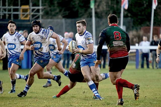 Tom Lewis attacks for the Lions against Lichfield. Picture: Mick Sutterby