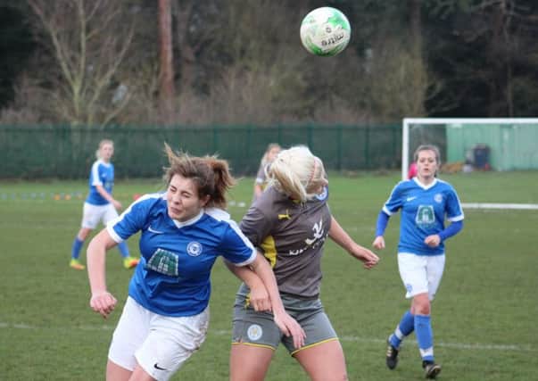 Eleanor Boothman (left) battles for possession for Posh. Picture: Gary Reed