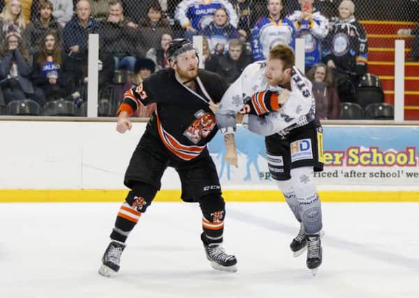 A battle of the giants featuring Telford's Doug Clarkson and Phantoms' Petr Stepanek. Picture: Tom Scott