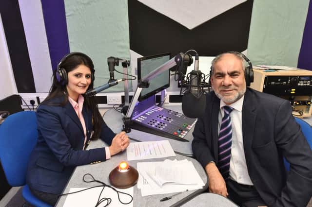 Dr Fhabina Quyyum with Ansar Ali at Radio Salaam following huge fundraising appeal for aid to Syria EMN-161219-183032009