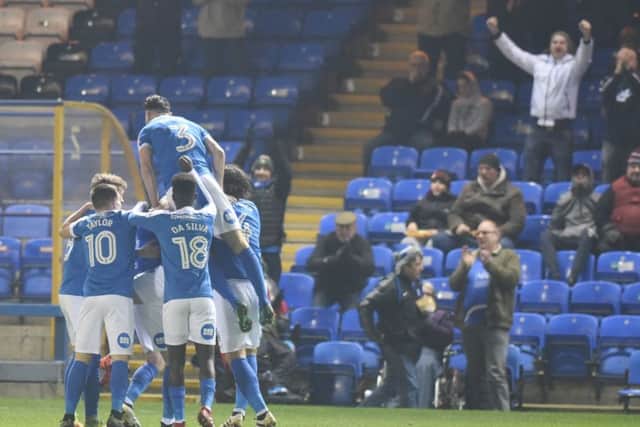 Players and fans celebrate Gwion Edwards' goal against Notts County. Picture: David Lowndes