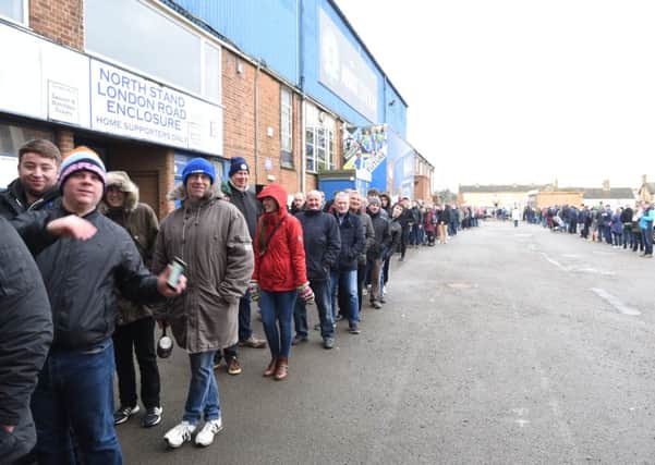Posh fans queueing for Chelsea tickets. Photo: David Lowndes.