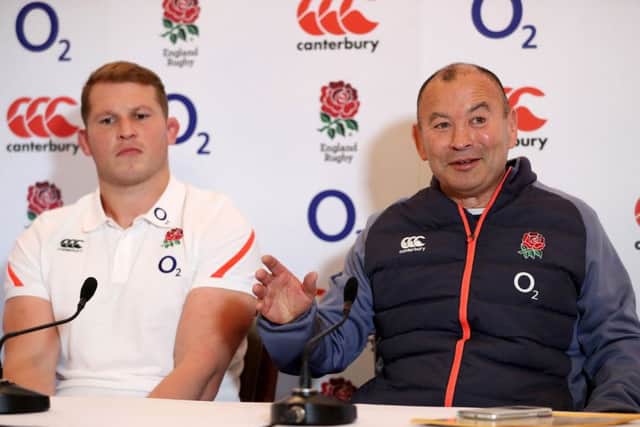 A hero and a villain. Eddie Jones (right) and Dylan Hartley.