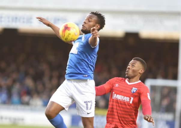 Posh striker Shaq Coulthirst controls the ball on his chest in the 1-1 draw with Gillingham. Photo: David Lowndes.