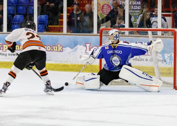 Phantoms back-up netminder Adam Long saw some third period action against MK.