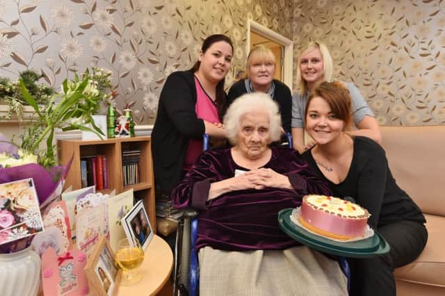 Florence Fraser (103) on her birthday at Aliwal Manor, Whittlesey with staff Jeni Watkins, Carol Lyon, Vicky English and Nicole Moore. EMN-161220-165014009