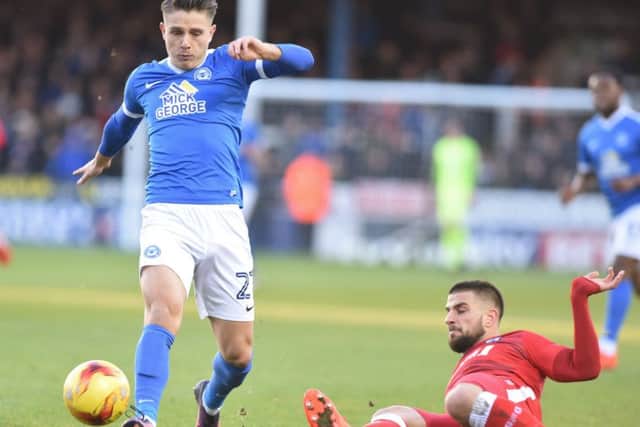Posh striker Tom Nichols has the backing of manager Grant McCann.