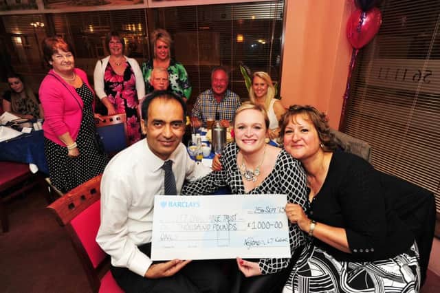 Pictured at a charity meal in aid of the Radiotherapy and Chemotherapy unit at PCH held at Maharani's in 2013 are (front), Mohammed Farooq, Nicola Jones, and Lesley Kalina ENGEMN00120130925195730