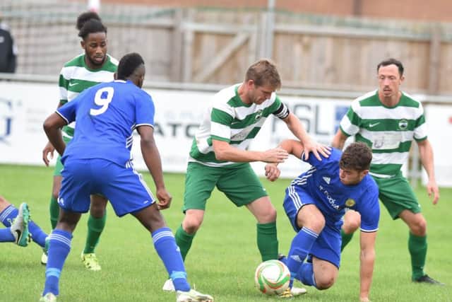 Dan Banister, who misses the FA Vase game, in action in the United Counties Premier Division game between Newport Pagnell and Peterborough Sports.