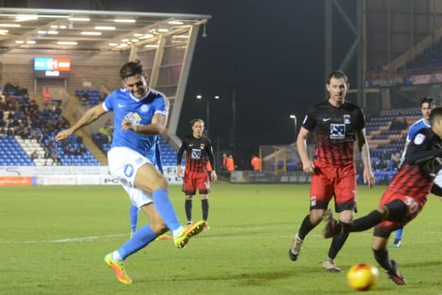 Posh centre back Ryan Tafazolli forced a save with this late shot at the Coventry goal. Photo: David Lowndes.