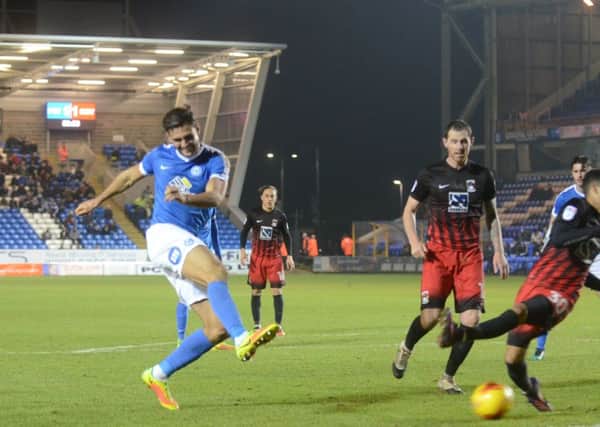 Posh centre back Ryan Tafazolli forced a save with this late shot at the Coventry goal. Photo: David Lowndes.
