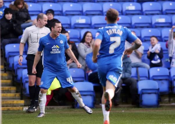 Aaron Williams celebrates a Posh goal against Port Vale.
