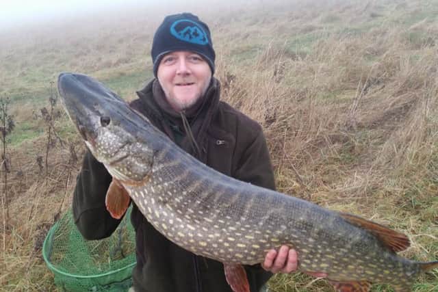 Andrew Bell with his 29lb 12oz pike.