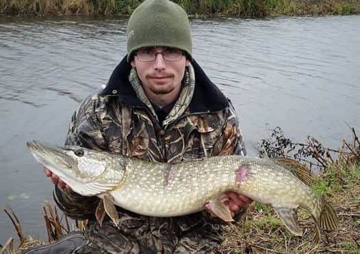 Ashley Hill with a fine pike taken from the fenland drains.
