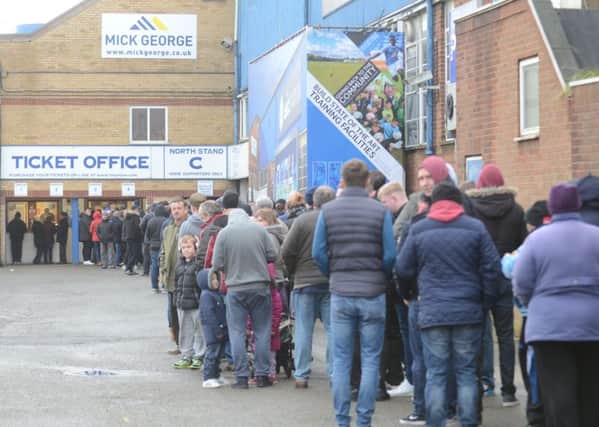 Posh fans queueing up for Chelsea FA Cup tickets.