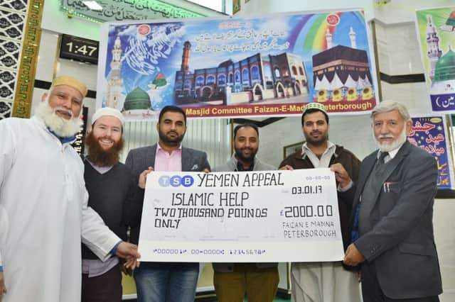 Mohammed Younas, Abdul Rahmaan, Usman Mustafa, Zahid Akbar, Zeeshan Ahmed and Abdul Choudhuri at cheque pres from the Faizan-e-Madina mosque to the Yemen Appeal Islamic Help fund