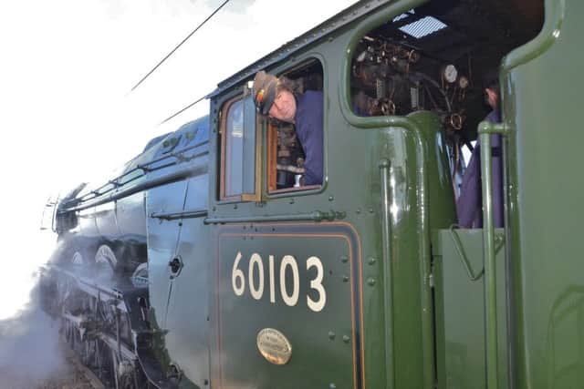 Flying Scotsman at Peterborough Station EMN-160225-170311009