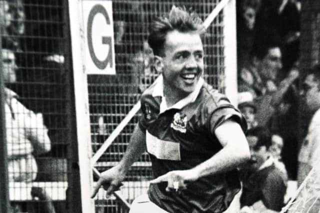 Mick Halsall celebrates a Posh goal.