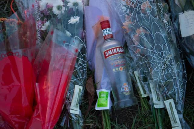 Tributes are left by the side of the road for the pair killed in a hit and run in Yaxley.,
Yaxley, Peterborough
05/01/2017. 
Picture by Terry Harris. THA