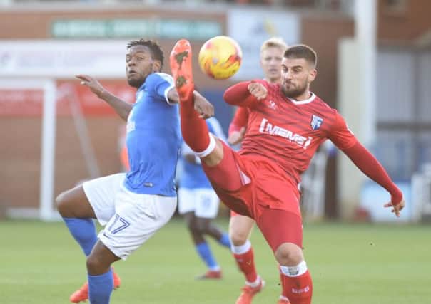 Shaquile Coulthirst in action against Gillingham.