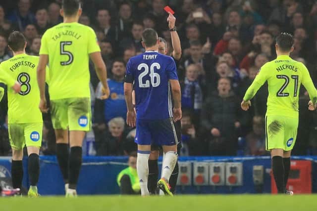 Chelsea's John Terry receives a red card for a foul on Lee Angol. Picture:: Adam Davy/PA Wire.