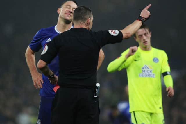 Chelsea defender John Terry is dismissed by referee Kevin Friend.
