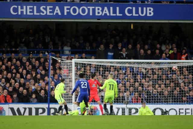 Posh fans watch as Pedro opens the scoring against Chelsea. Photo: Joe Dent/theposh.com