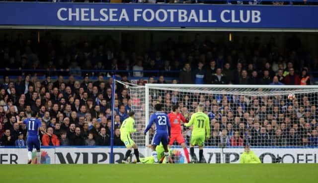 Posh fans watch as Pedro opens the scoring against Chelsea. Photo: Joe Dent/theposh.com