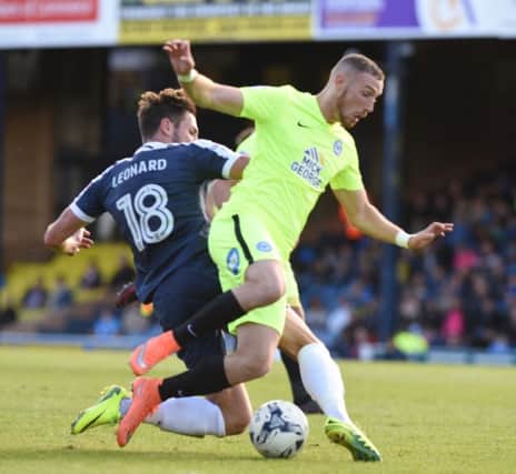 Marcus Maddison in action for Posh at Southend.