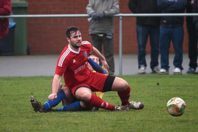 Action from Wisbech Town's 1-1 draw with Wellingborough last weekend. Photo: Adam Fairborther.