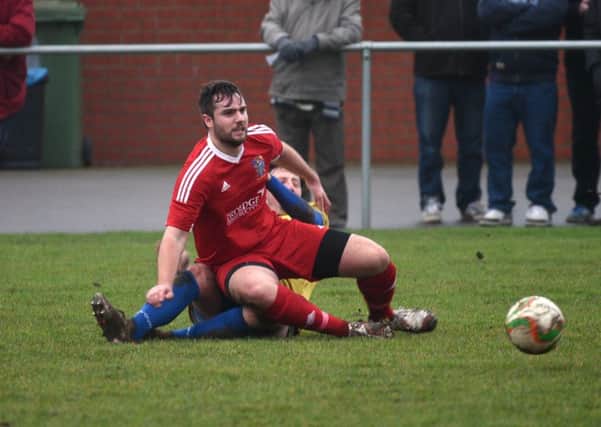 Action from Wisbech Town's 1-1 draw with Wellingborough last weekend. Photo: Adam Fairborther.