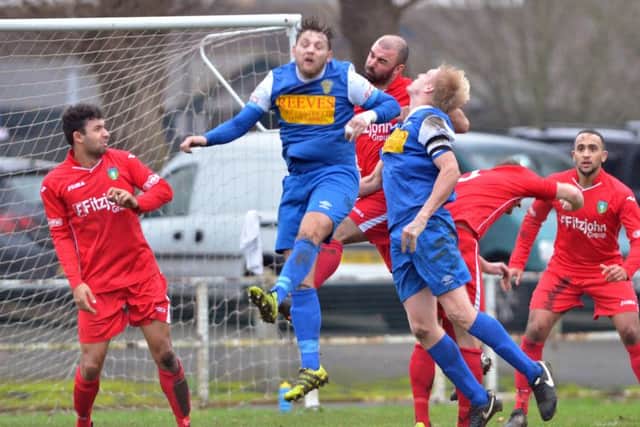 Action from Spalding United's 0-0 draw with Kidsgrove (red) on Saturday. Photo: Tim Wilson.