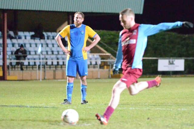 Scott Coupland scored for Deeping against Wisbech.