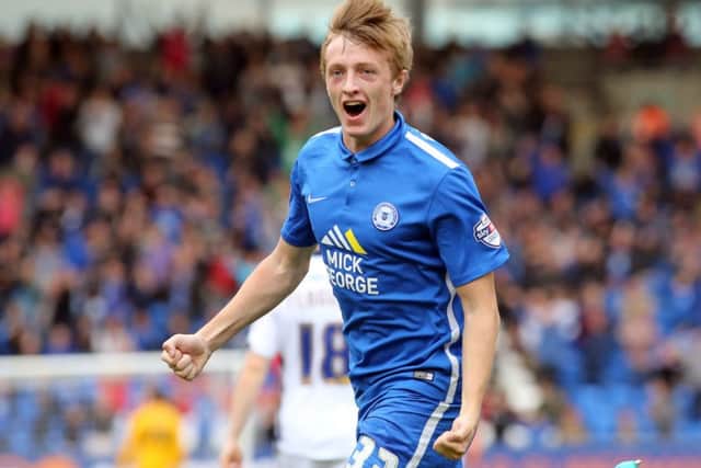 Posh midfielder Chris Forrester celebrates a goal against Millwall last season. Photo: Joe Dent/theposh.com.