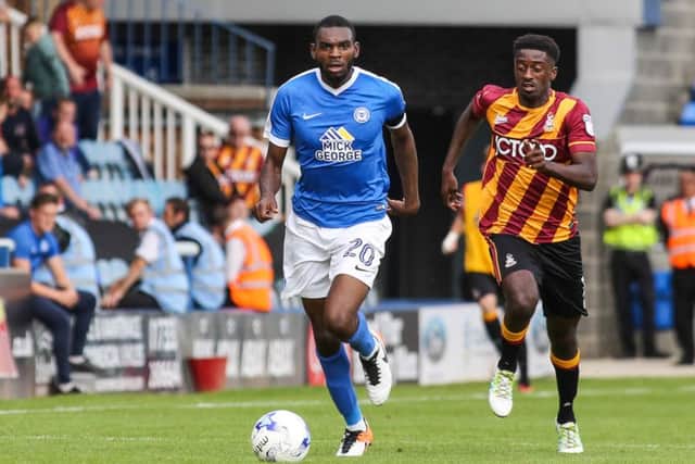 Hayden White gets away from Bradford City's Jordy Hiwula EMN-160817-155314002