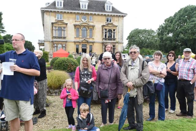 Thorpe Hall summer fete. Palmerston Arms Ukelele Group entertain visitors. Crowd shot EMN-160907-194830009