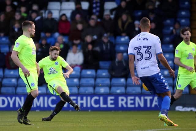 Gwion Edwards of Peterborough United shoots at goal which leads to the opening goal of the game. Picture: Joe Dent