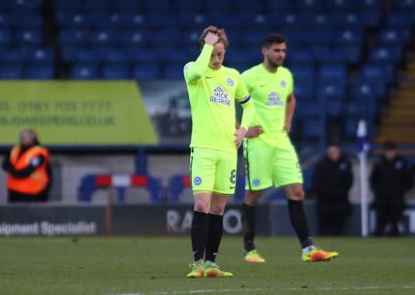 Chris Forrester of Peterborough United cuts a dejected figure after Bury score. Picture: Joe Dent