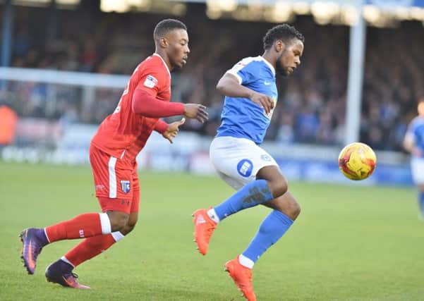 Posh striker Shaquile Coulthirst is a wanted man.