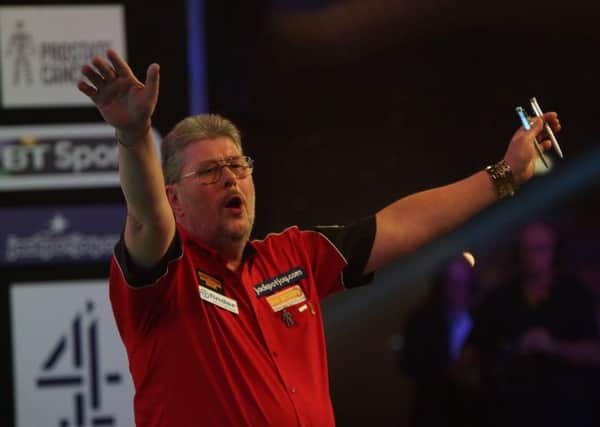 Martin Adams pictured celebrating a win on the Lakeside stage last week.