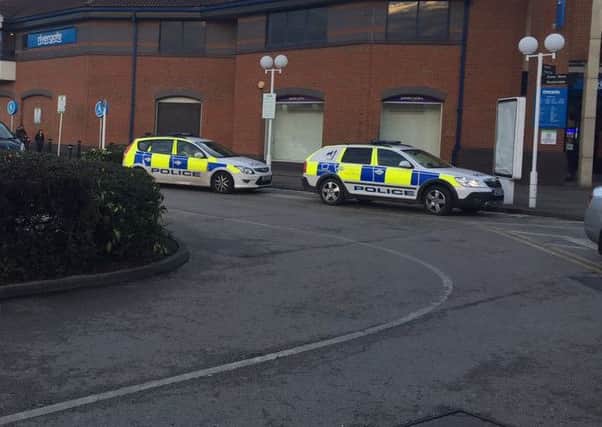Police at the scene of an incident at Rivergate Arcade