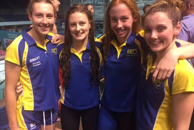 The COPS record-breaking 4x100m medley team of, from the left, Bethany Saunders , Rachel Wellings , Poppy Richardson and Mollie Allen.