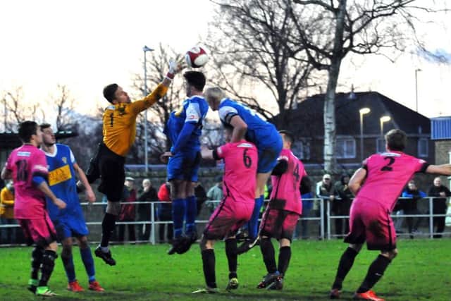Action from Spalding United's defeat at the hands of leaders Shaw Lane last weekend. Photo: Tim Wilson.