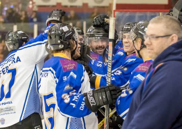 Ales Padelek (centre) is surrounded by team-mates after scoring the insurance empty goal. Picture: Tom Scott