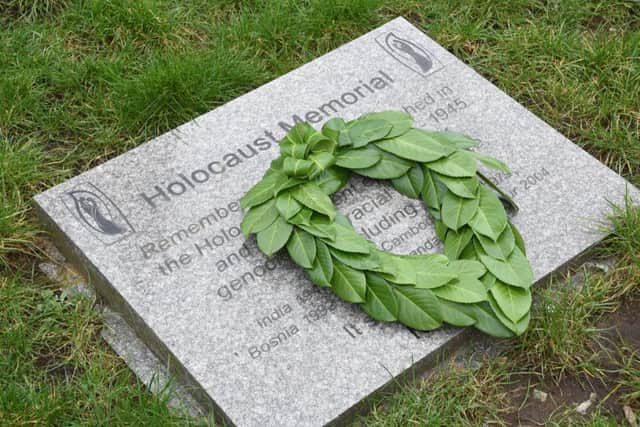 Peterborough Holocaust Memorial Day Service at St John's Church. The wreath laying ceremony at St John's square EMN-160127-141521009